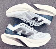 New Balance SC Elite V4 WHITE NAVY