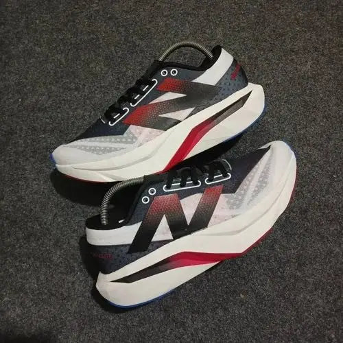 New Balance sc elite white black red