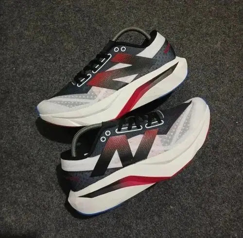 New Balance sc elite white black red