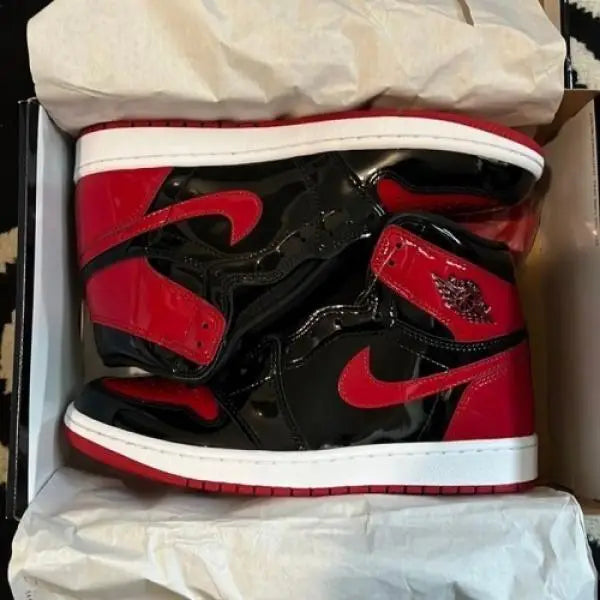 Nik_e Jordan Retro 1 Bred Patant Surplus Semi UA